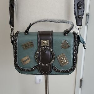 Green and Brown Crossbody Bag with Structured Design